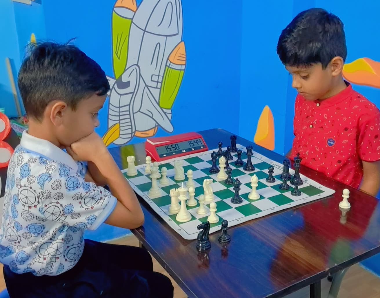 Focused student calculating next move