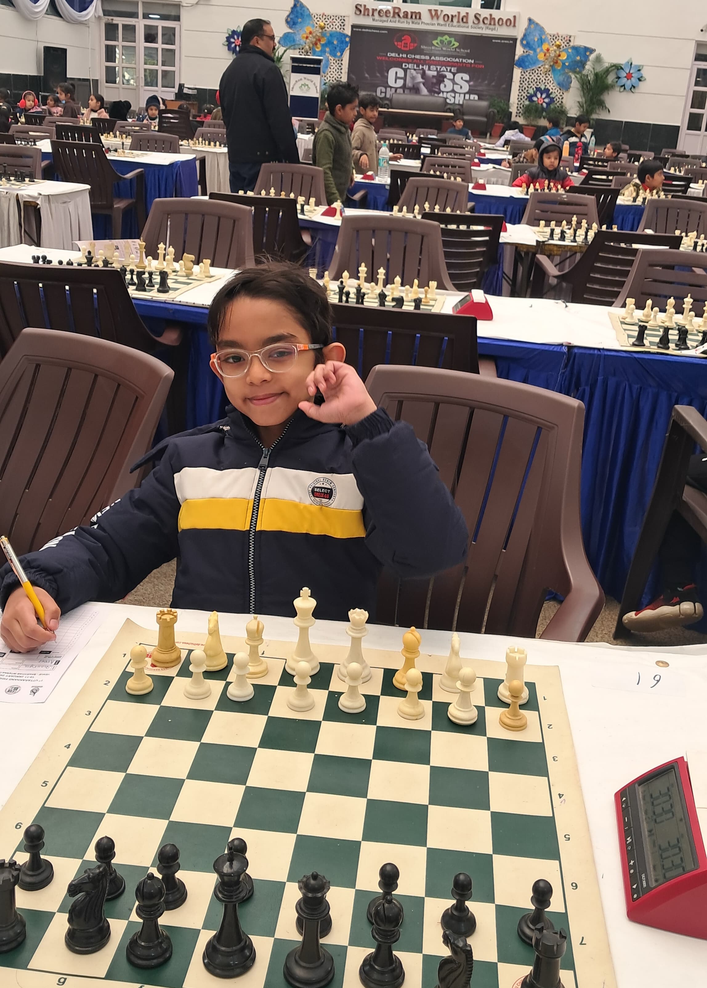 Student concentrating during mid-game classroom match