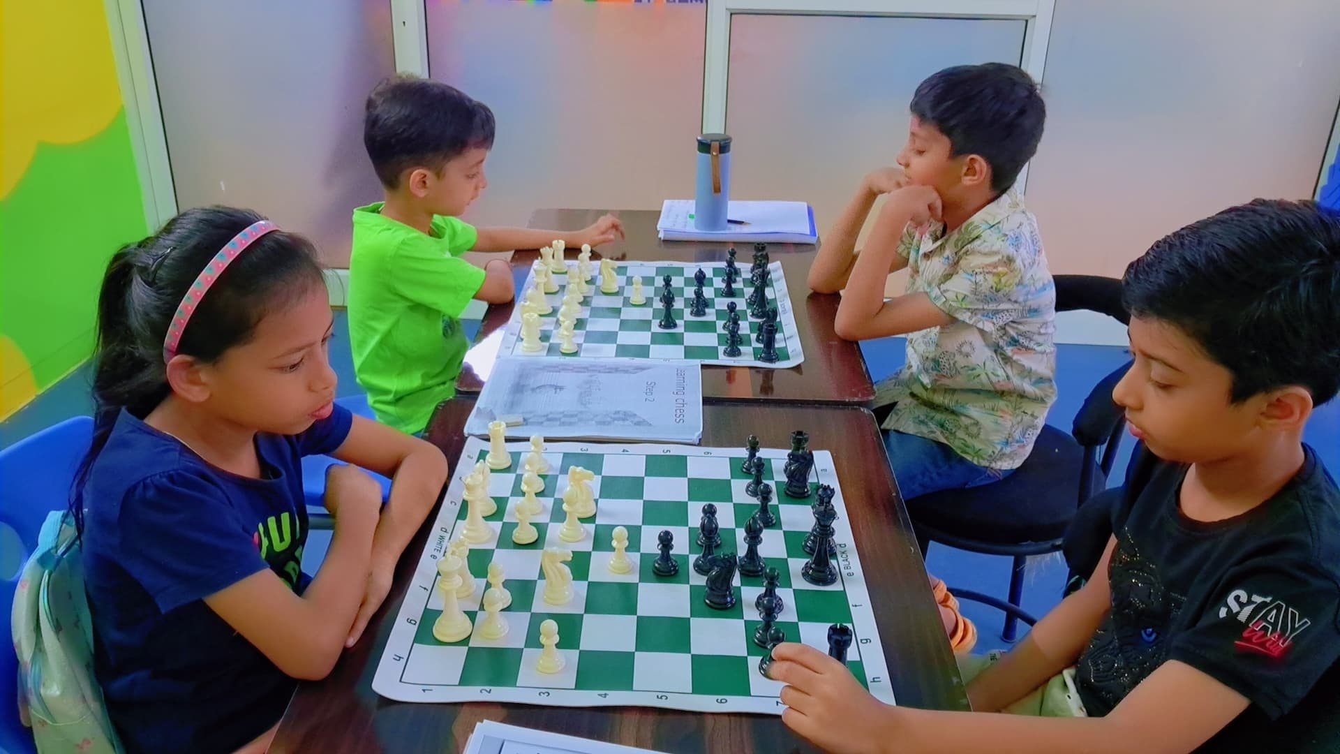 Young student studying complex chess position