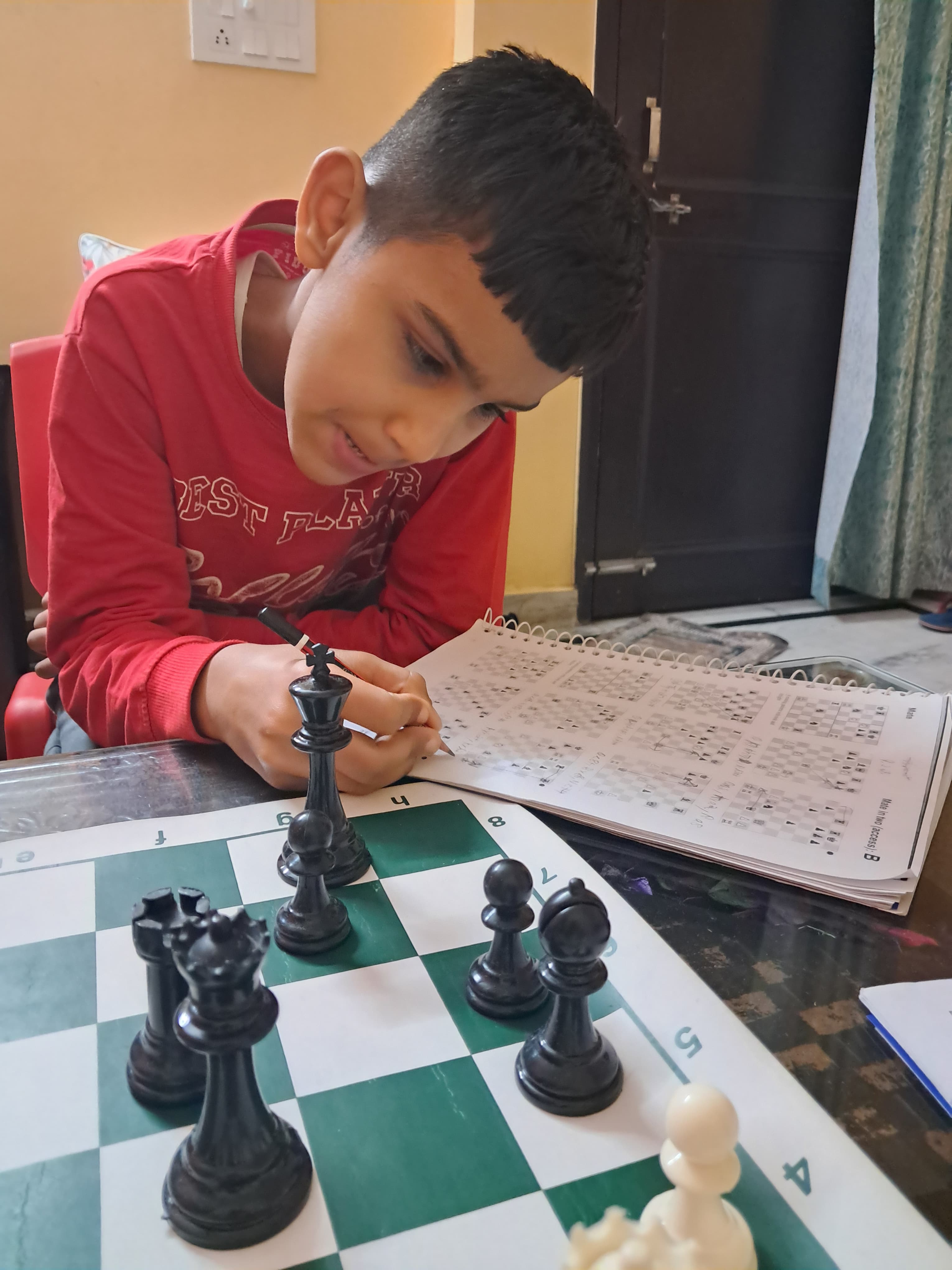 Young chess players practicing tournament format games